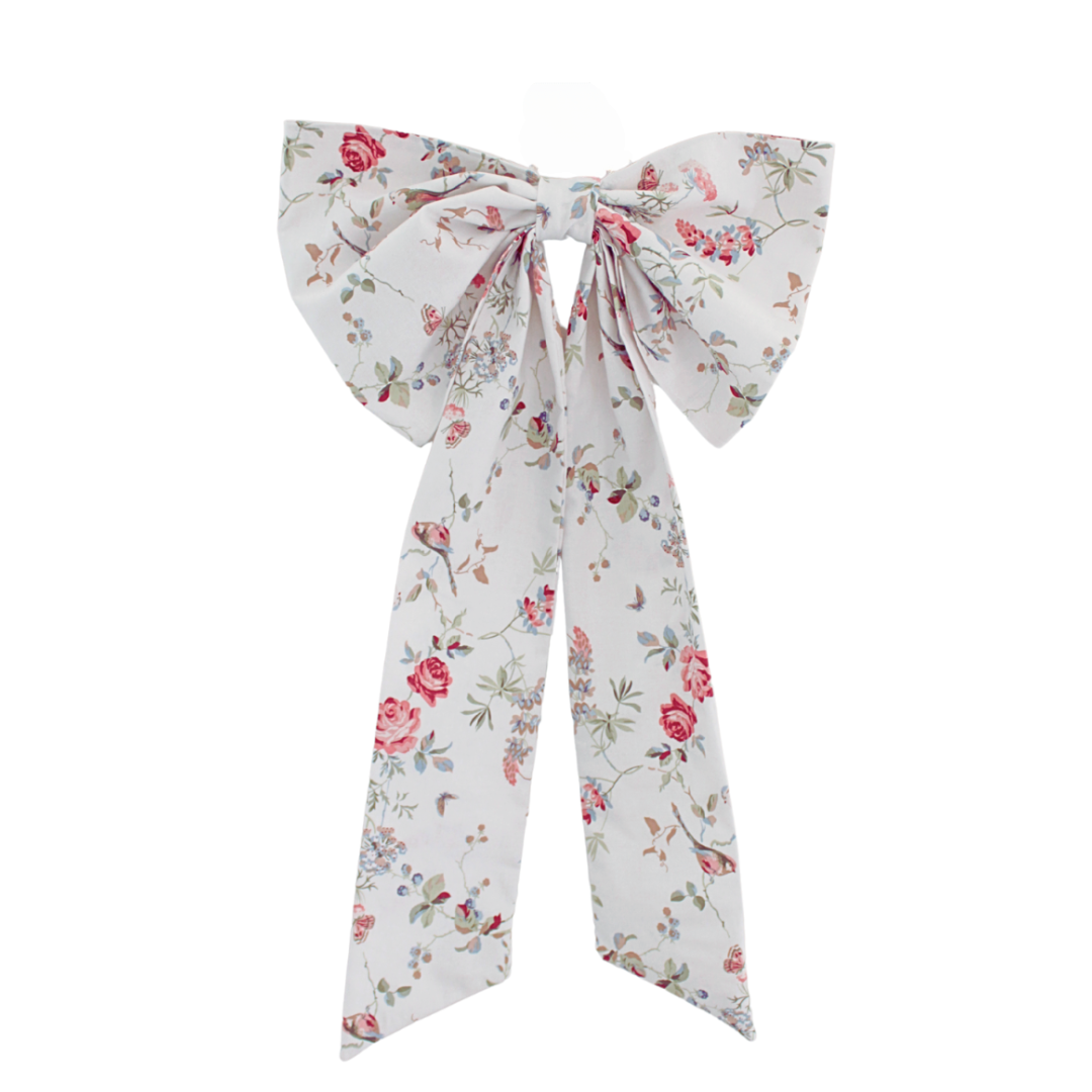 Floral patterned bow on a white background