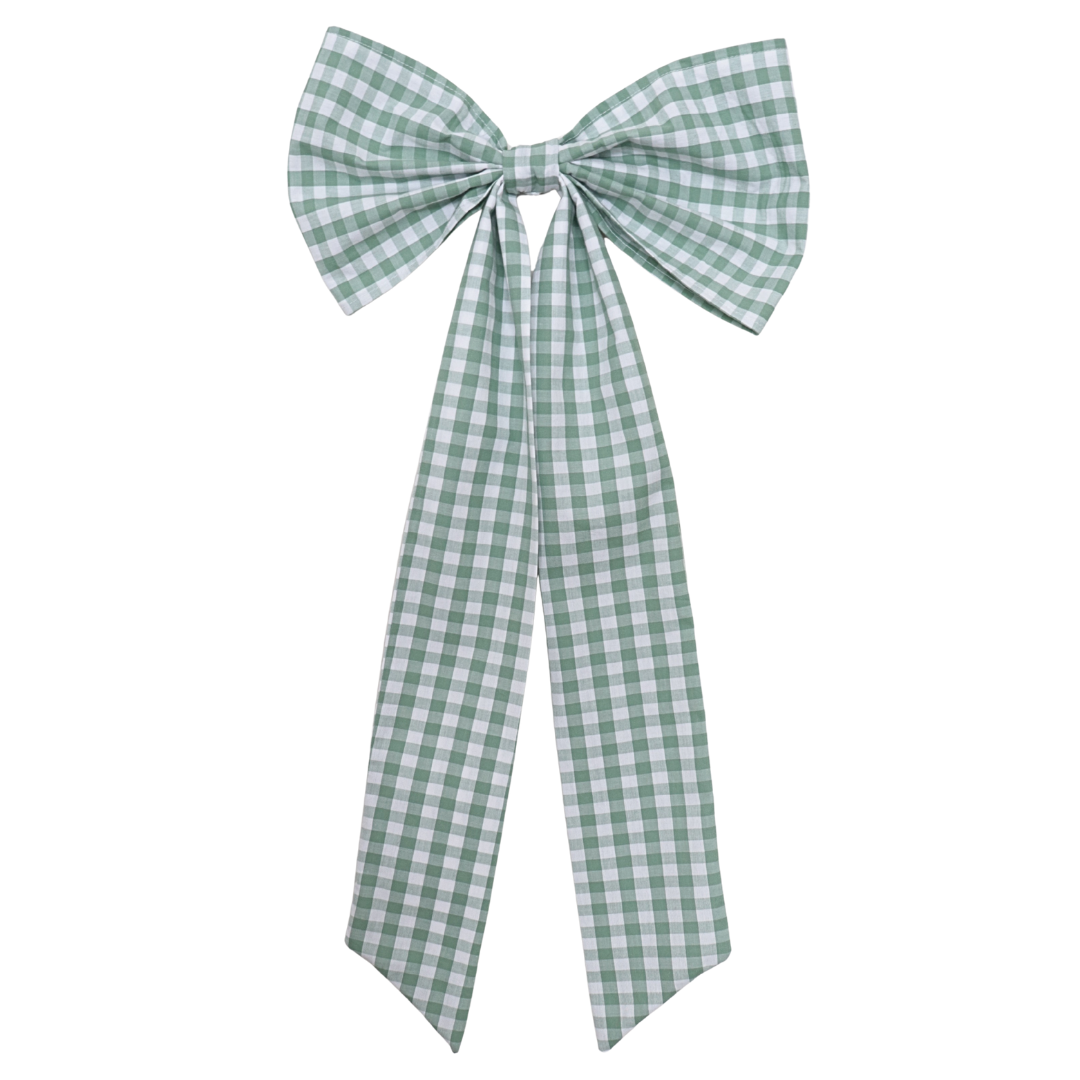 Green and white checkered bow on a white background