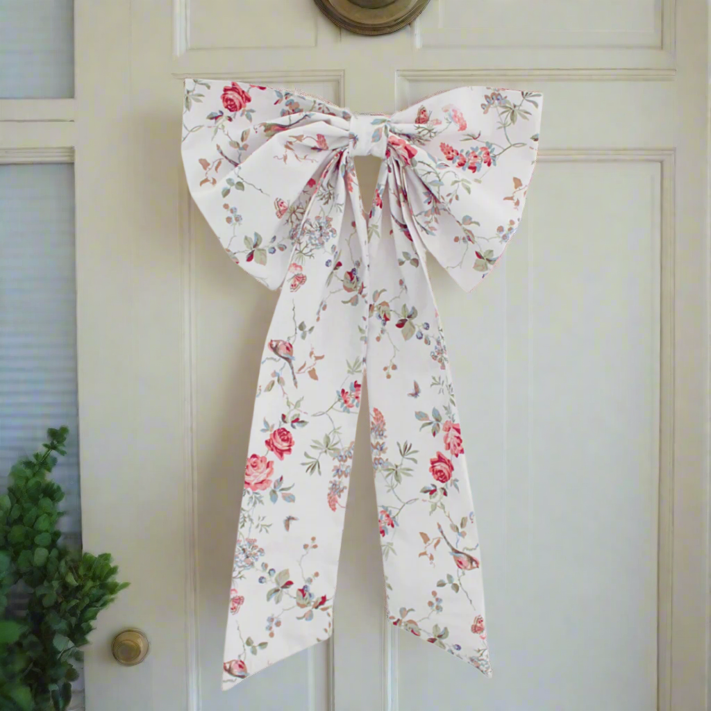 Floral patterned bow on a white background