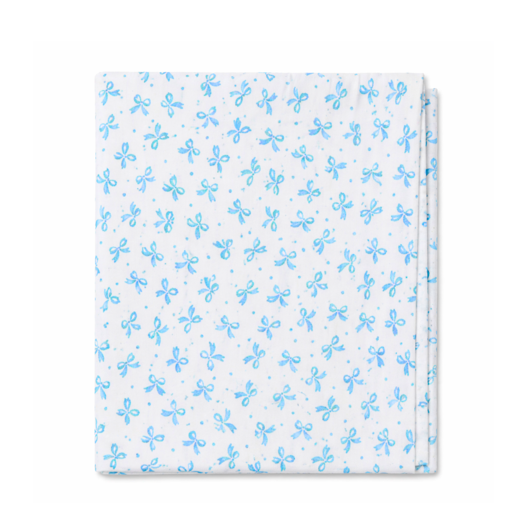 Floral patterned fabric with blue flowers on a white background