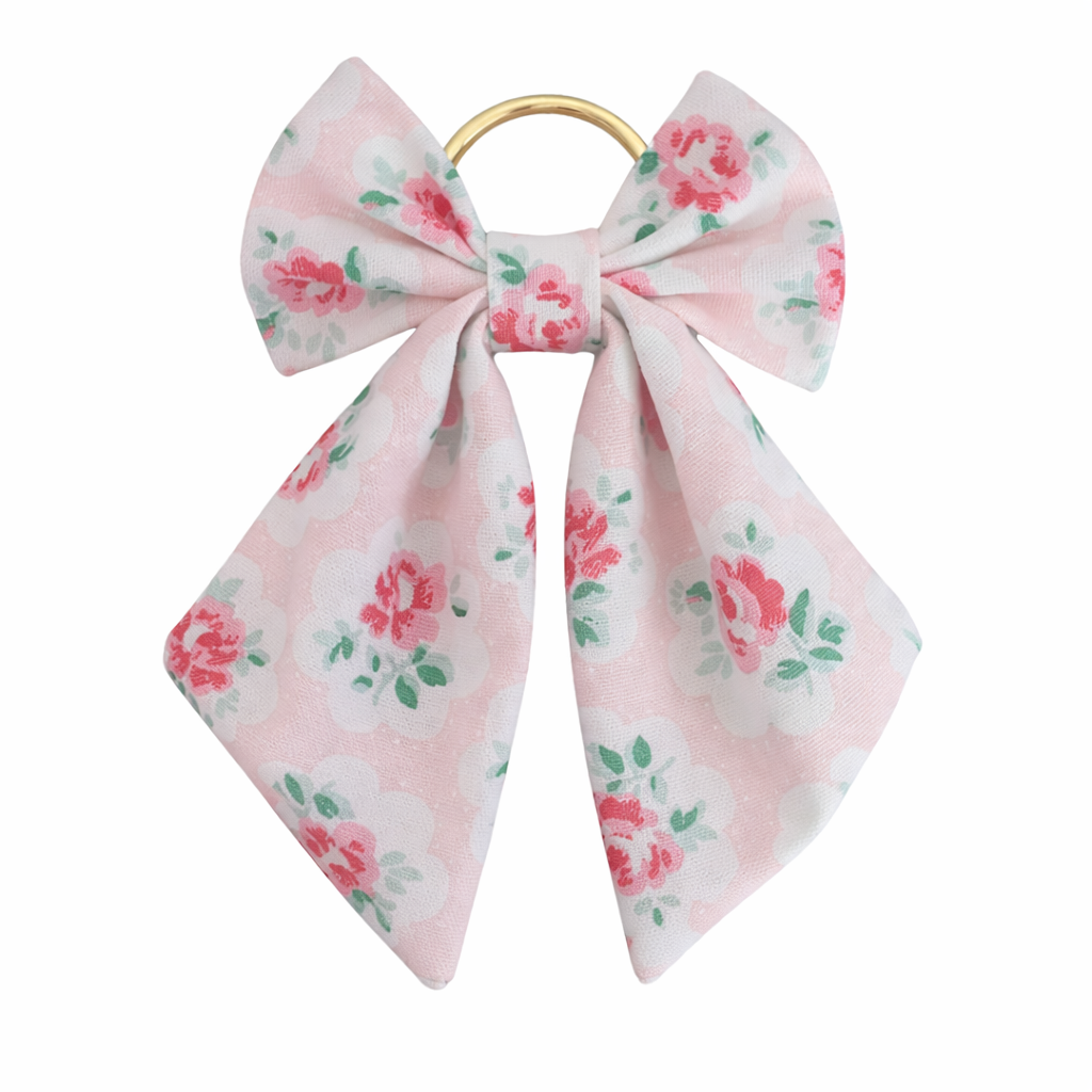 Floral bow napkin ring on a white background
