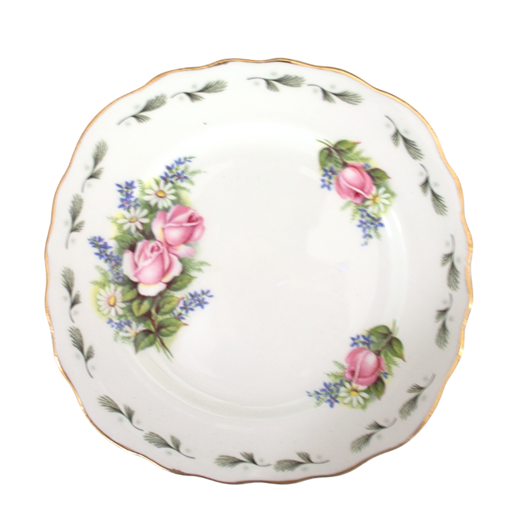 Decorative plate with floral design on a white background