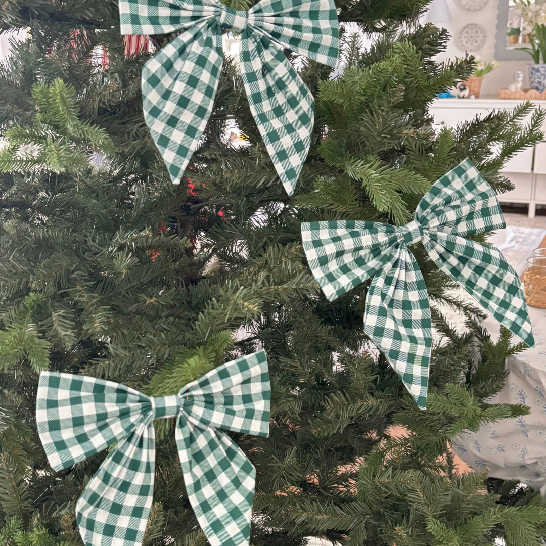 Green and white checkered bows on a Christmas tree