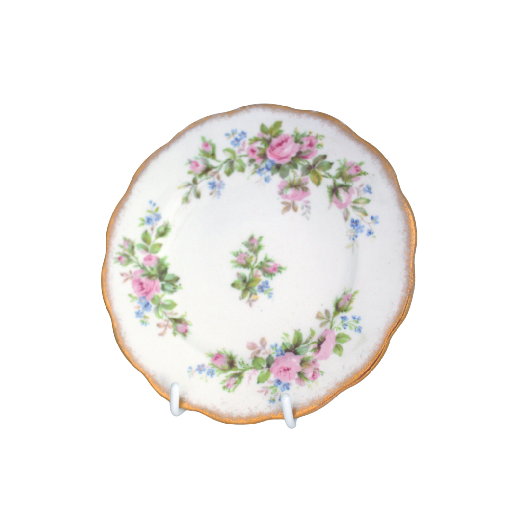 Decorative ceramic plate with floral design on a white background