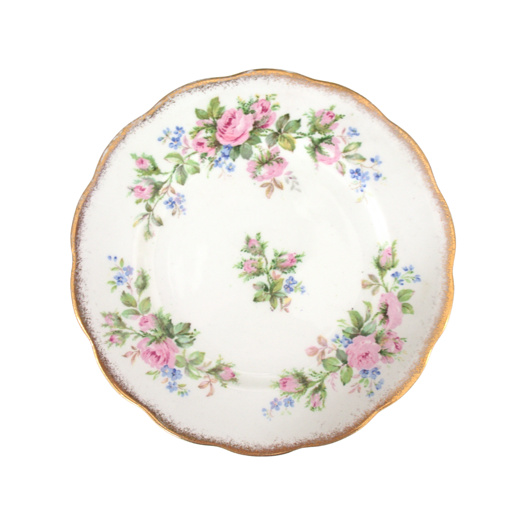 Decorative plate with floral design on a white background