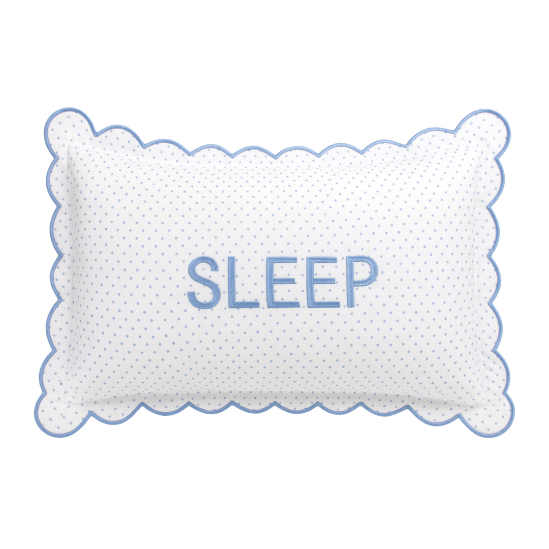 White pillow with blue text spelling 'SLEEP' on a white background